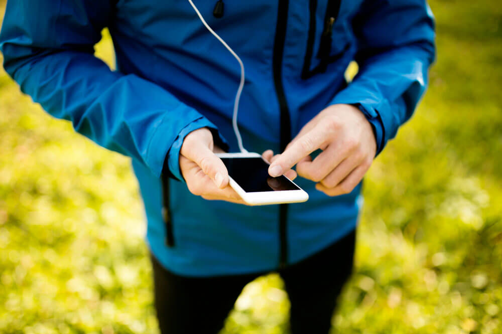 Runner using a phone app